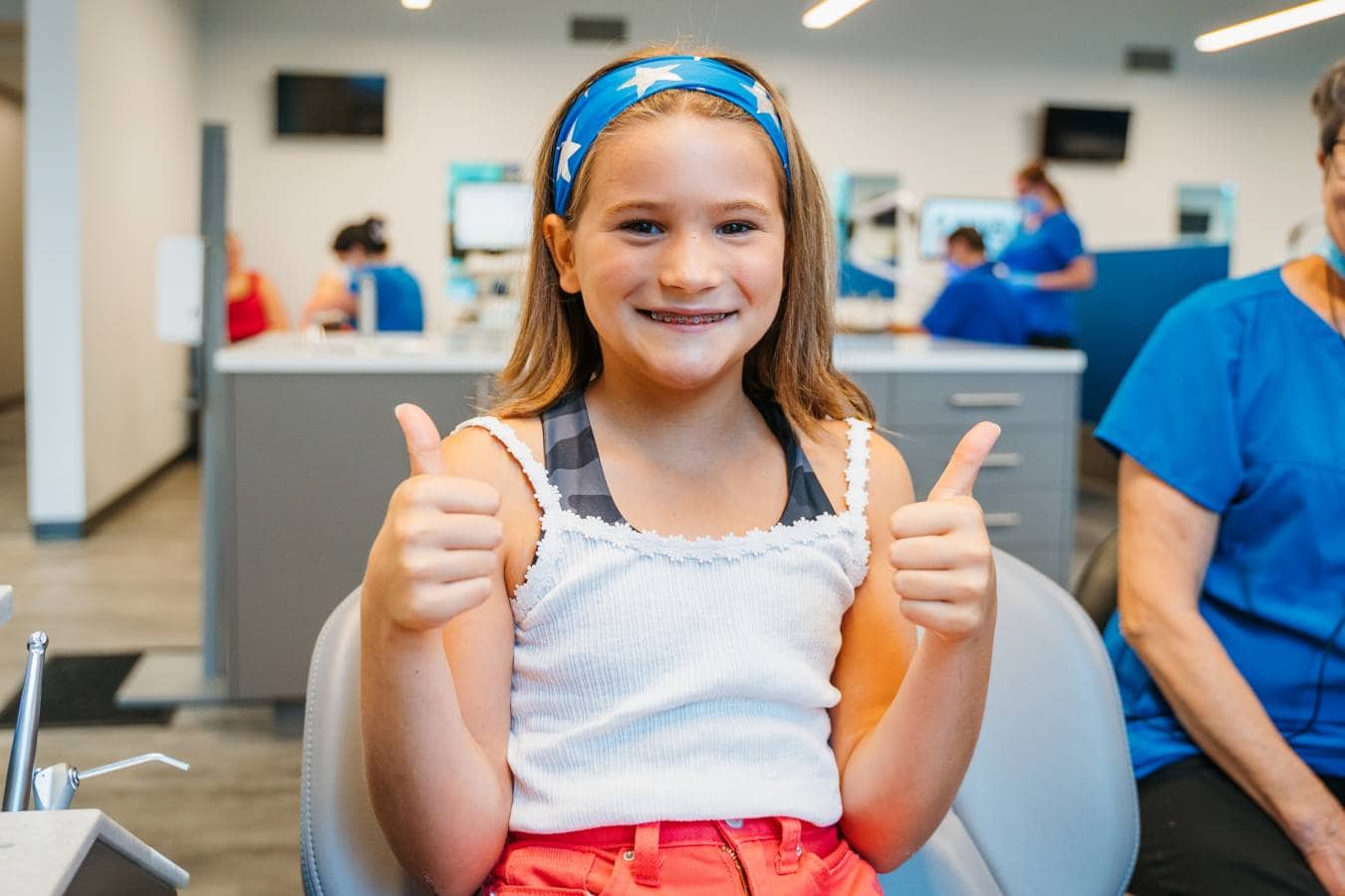 young girl with braces